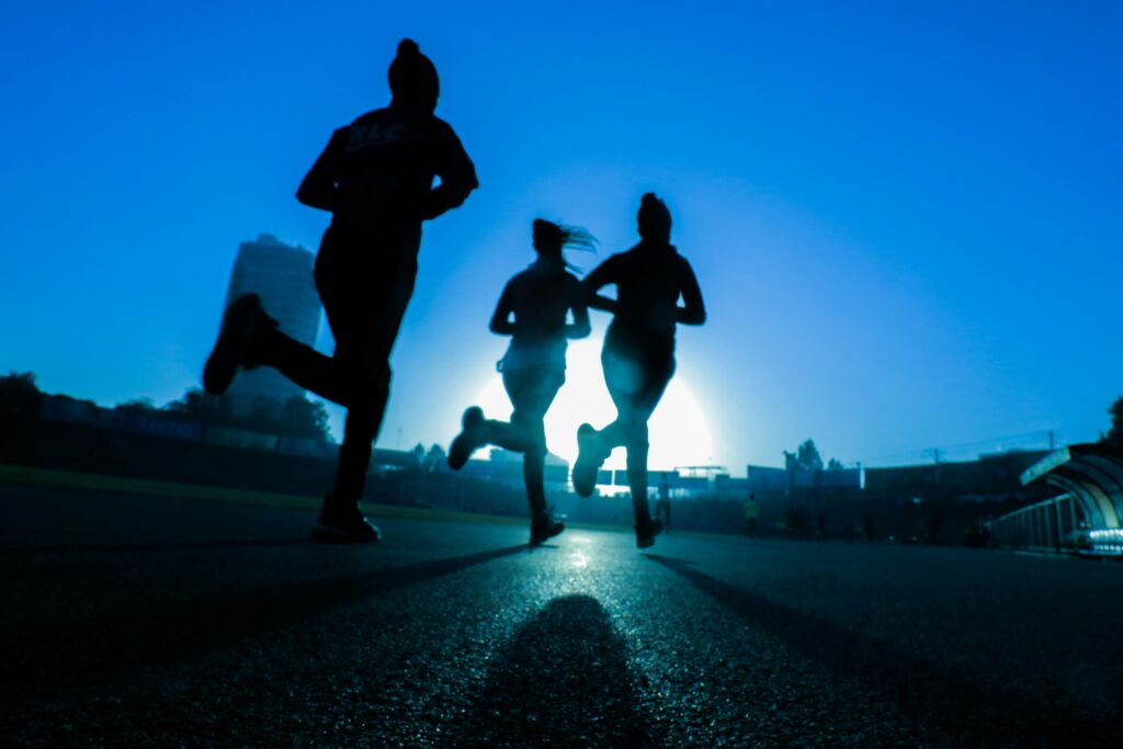 three-women-running-together